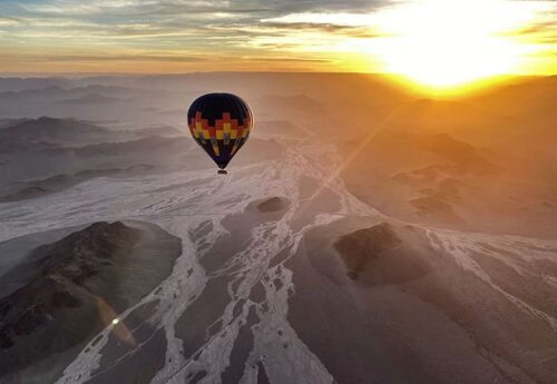 Balloon over flooded desert